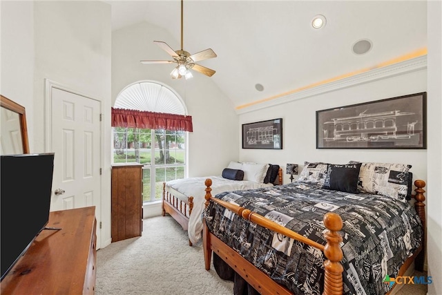bedroom with high vaulted ceiling, ceiling fan, and carpet flooring