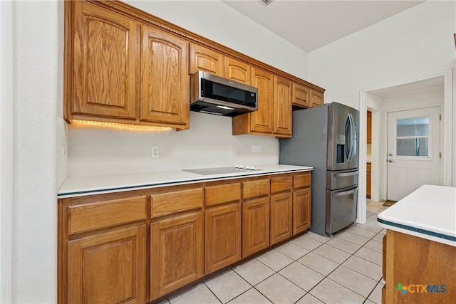 office area with baseboards, built in study area, ceiling fan, hardwood / wood-style flooring, and ornamental molding