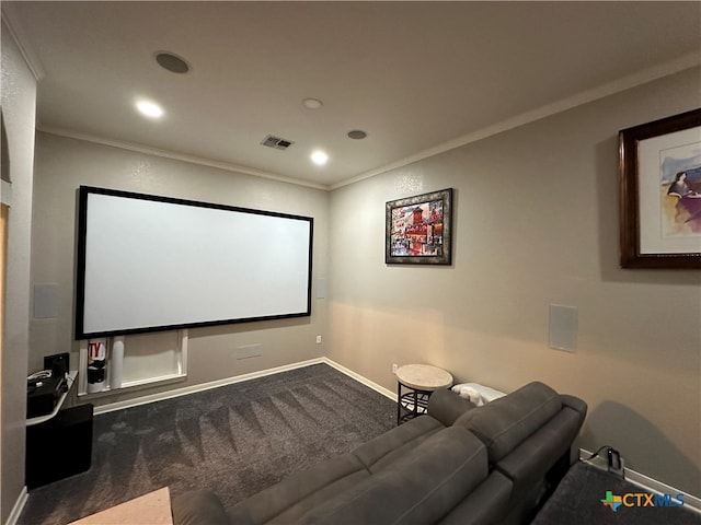 carpeted home theater with ornamental molding