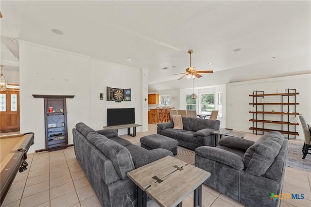 cinema room with visible vents, baseboards, carpet, recessed lighting, and ornamental molding