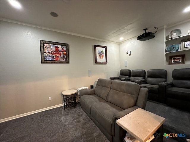 carpeted home theater with ornamental molding