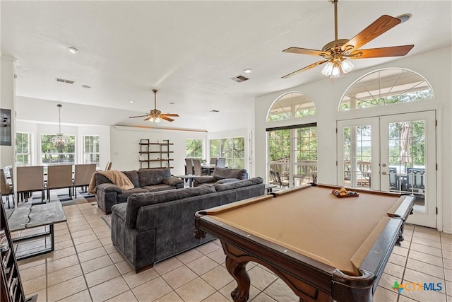 carpeted home theater room featuring recessed lighting, crown molding, baseboards, and tile patterned floors