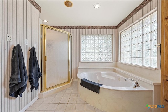 full bath with wallpapered walls, tile patterned flooring, a shower stall, and a tub with jets