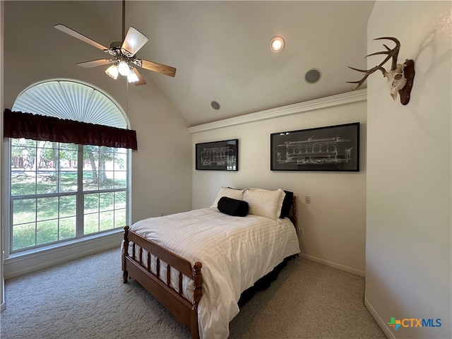 bedroom featuring high vaulted ceiling, light carpet, and ceiling fan