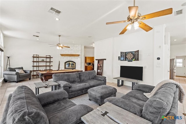 foyer featuring a barn door, crown molding, a textured ceiling, a textured wall, and baseboards