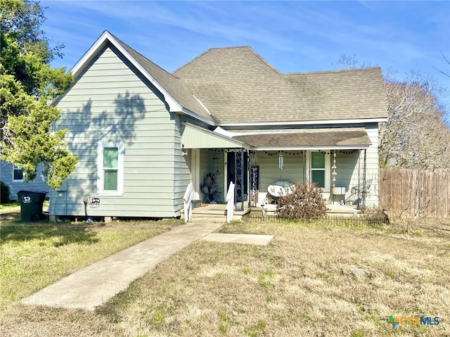 view of front of house featuring a porch and a front lawn