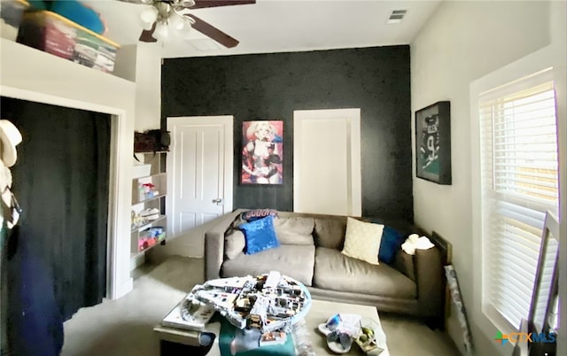 living room with ceiling fan