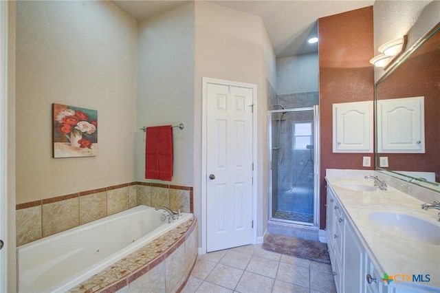 full bath with a garden tub, tile patterned flooring, a sink, and a stall shower