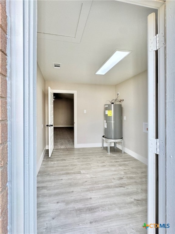 interior space featuring electric water heater