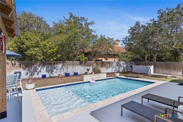 view of pool featuring a fenced in pool, a patio area, and a fenced backyard