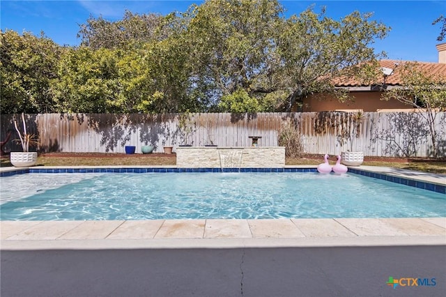 view of swimming pool featuring a fenced backyard and a fenced in pool