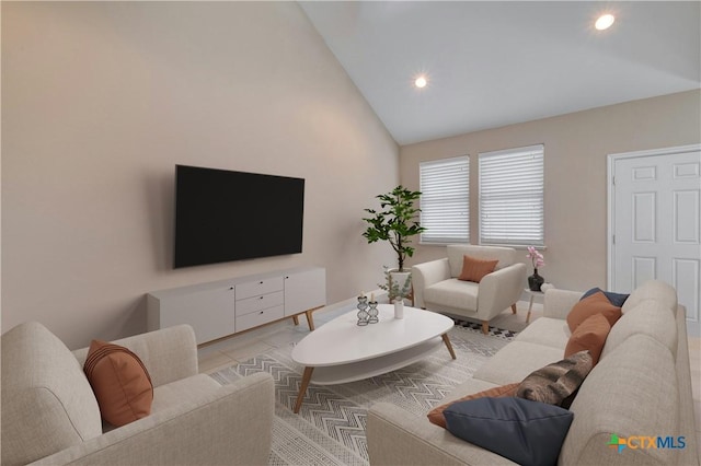 tiled living room with high vaulted ceiling