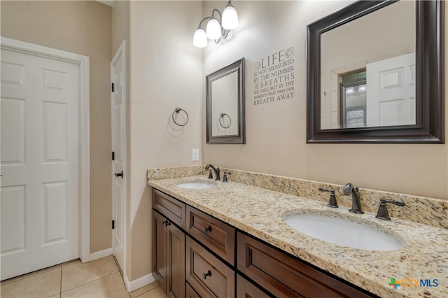 bathroom with vanity and tile patterned floors