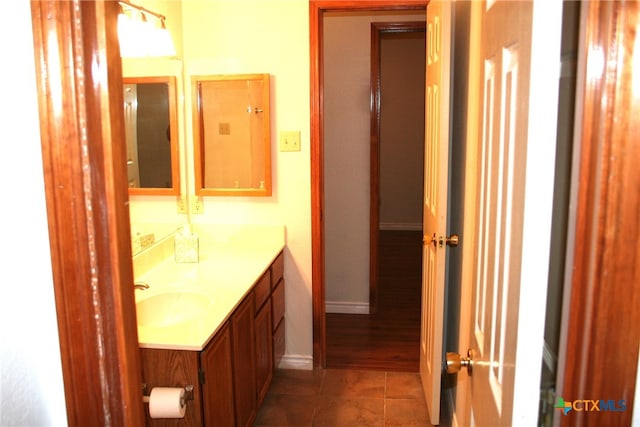 bathroom featuring tile patterned floors and vanity