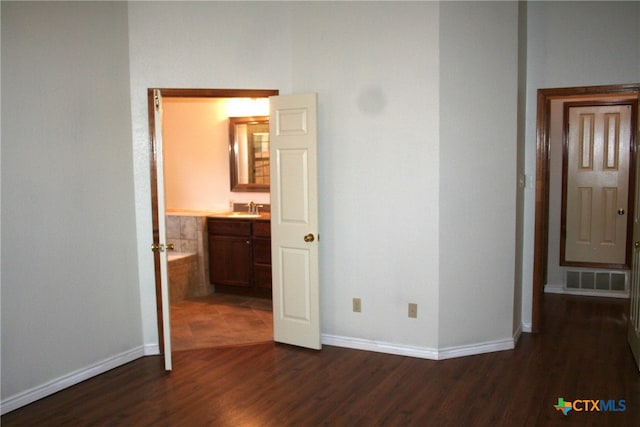 kitchen with appliances with stainless steel finishes, backsplash, and light tile patterned flooring