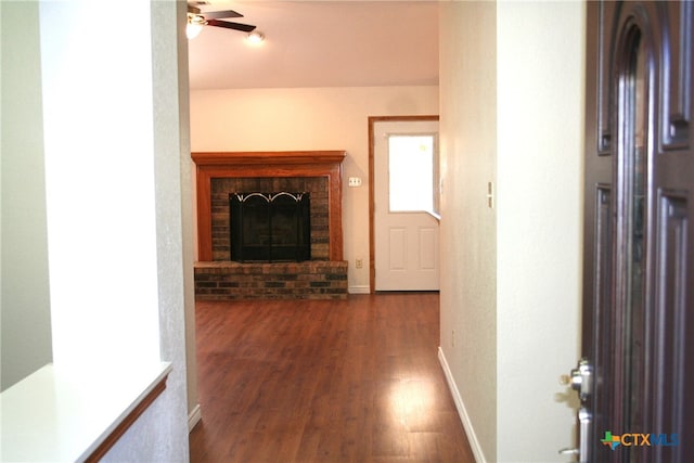 hallway with dark wood-type flooring