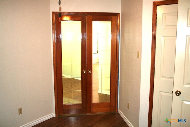 interior space featuring dark hardwood / wood-style flooring and sink