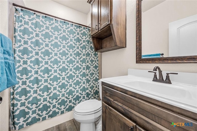 3424 Waggoner Dr, Belton, TX 76513 - full bath with vanity, a shower with shower curtain, and wood finished floors