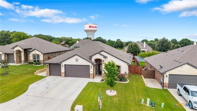 3424 Waggoner Dr, Belton, TX 76513 - french country inspired facade featuring a garage, concrete driveway, brick siding, and a shingled roof