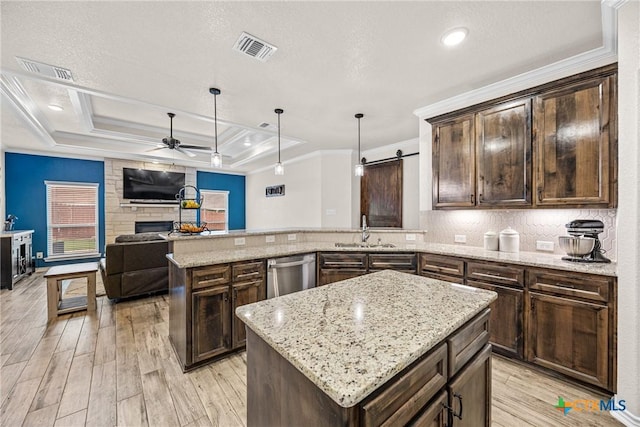 3424 Waggoner Dr, Belton, TX 76513 - kitchen featuring dishwasher, a raised ceiling, a peninsula, light wood-style floors, and a ceiling fan