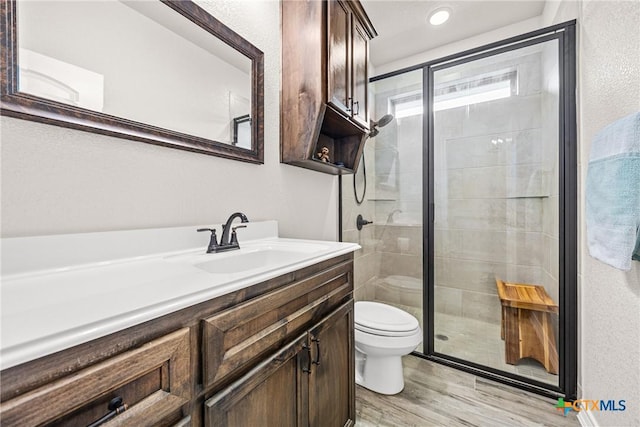 3424 Waggoner Dr, Belton, TX 76513 - bathroom featuring vanity, a shower stall, and wood finished floors