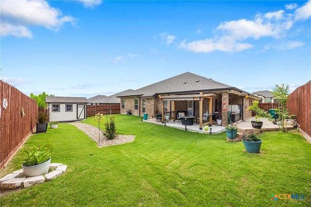 3424 Waggoner Dr, Belton, TX 76513 - rear view of house featuring a storage shed, a fenced backyard, a patio, and brick siding
