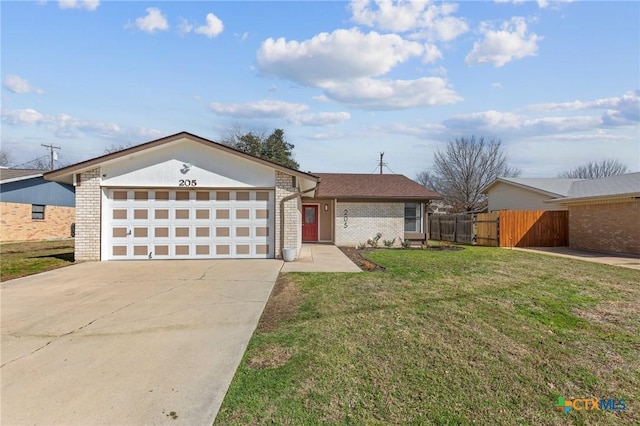 single story home featuring a garage and a front yard