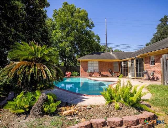 view of pool featuring a patio