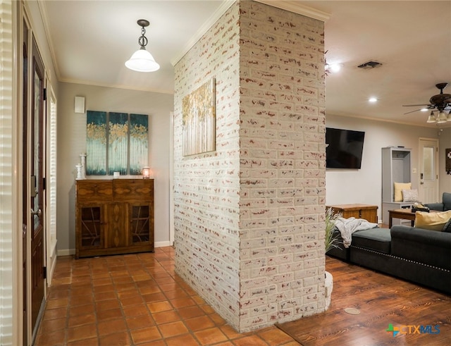 hall featuring dark wood-type flooring and ornamental molding