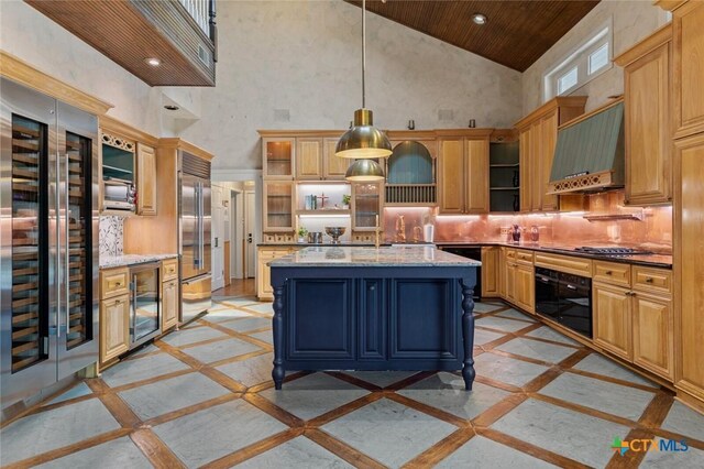 6 Carriage Sq, Waco, TX 76708 - kitchen with open shelves, high vaulted ceiling, oven, and wine cooler