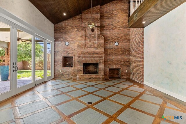 6 Carriage Sq, Waco, TX 76708 - unfurnished living room featuring high vaulted ceiling, a ceiling fan, wood ceiling, a fireplace, and baseboards