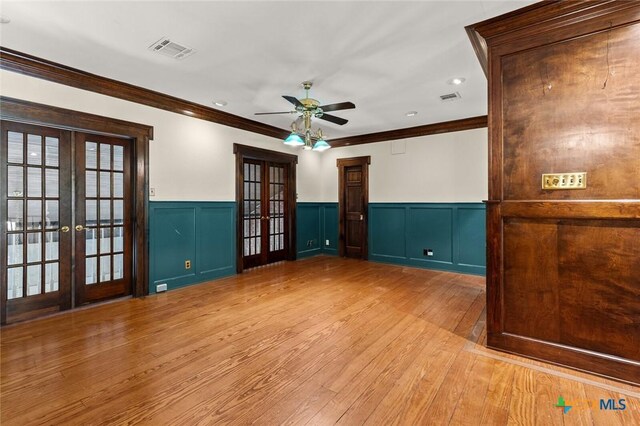 6 Carriage Sq, Waco, TX 76708 - empty room with french doors, visible vents, hardwood / wood-style flooring, and crown molding