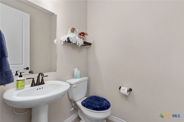 220 Bolivar Way Unit 101, San Marcos, TX 78666 - bathroom with toilet and baseboards