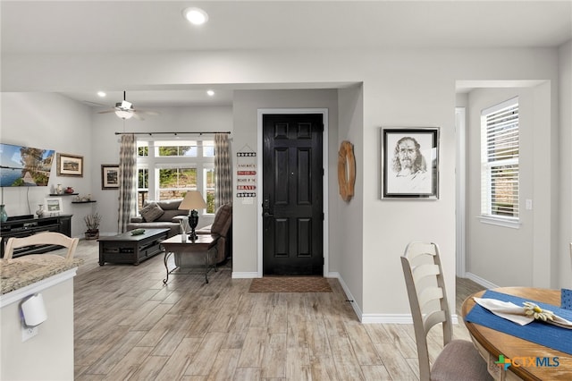 220 Bolivar Way Unit 101, San Marcos, TX 78666 - foyer entrance featuring ceiling fan, light wood finished floors, recessed lighting, and baseboards