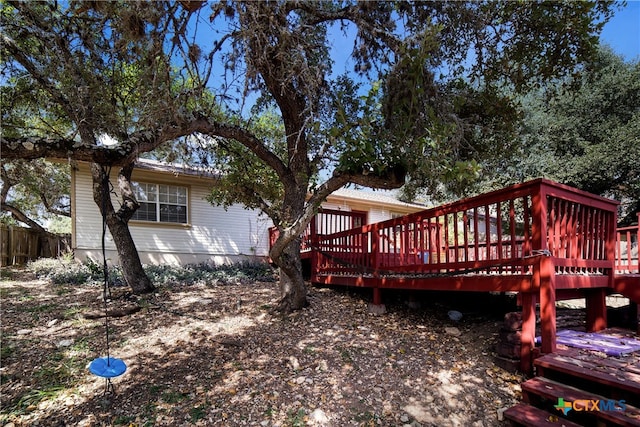 exterior space featuring a wooden deck