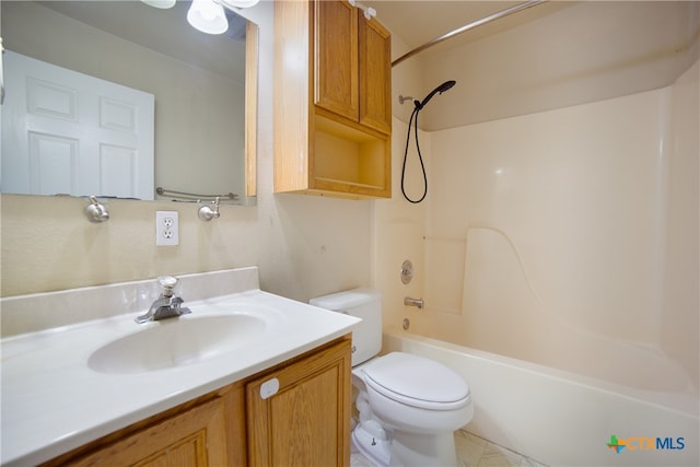 full bathroom featuring vanity, toilet, and  shower combination