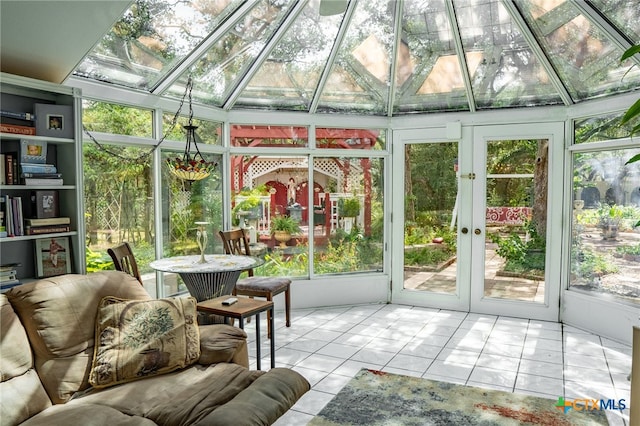 sunroom / solarium featuring french doors and plenty of natural light