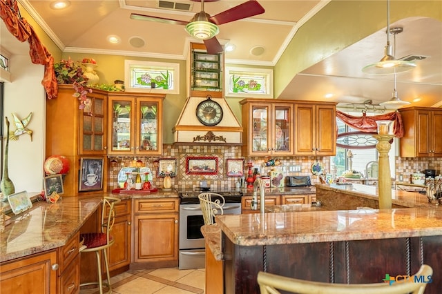 kitchen with ornamental molding, decorative backsplash, light stone counters, and electric range