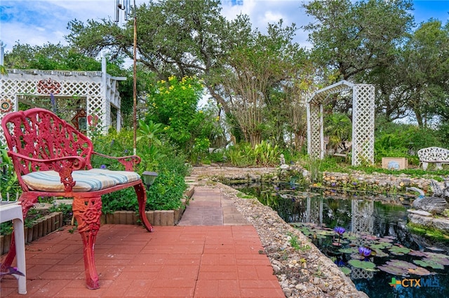 view of patio featuring a water view