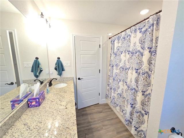 2635 Belle Hubbard Trl, Belton, TX 76513 - full bathroom with vanity, wood finished floors, and curtained shower
