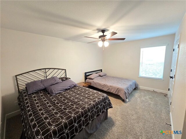2635 Belle Hubbard Trl, Belton, TX 76513 - carpeted bedroom featuring baseboards and a ceiling fan