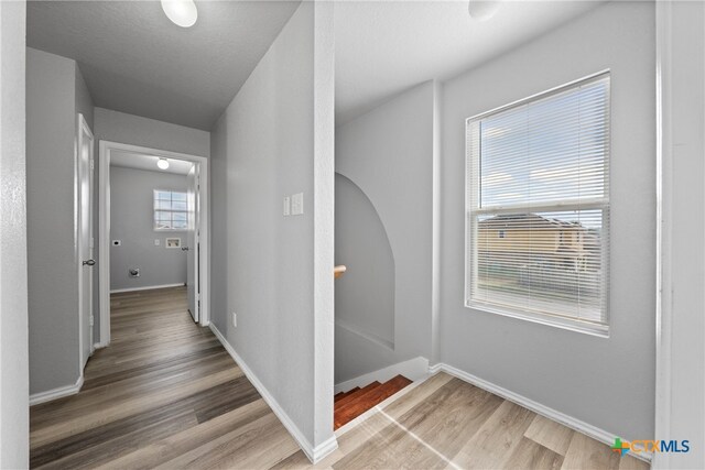 hall featuring hardwood / wood-style flooring