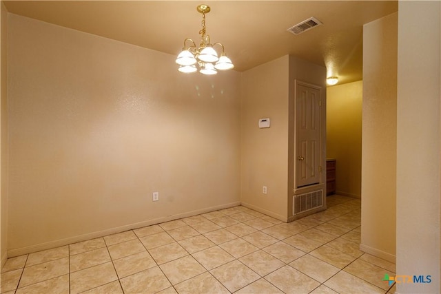 1513 Nicholas Cir, Killeen, TX 76542 - spare room featuring a chandelier, light tile patterned flooring, and baseboards