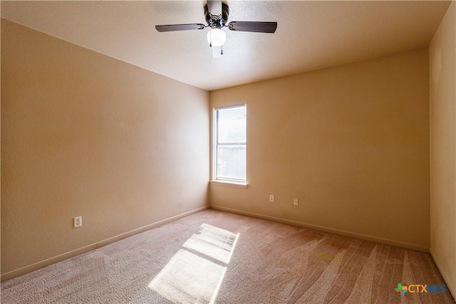 1513 Nicholas Cir, Killeen, TX 76542 - empty room with light carpet, baseboards, and ceiling fan