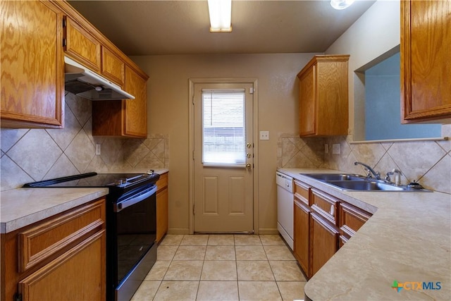 1513 Nicholas Cir, Killeen, TX 76542 - kitchen featuring black / electric stove, under cabinet range hood, a sink, and light countertops