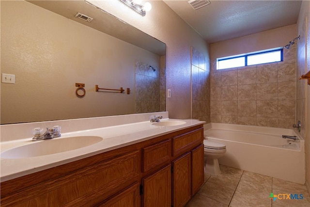 1513 Nicholas Cir, Killeen, TX 76542 - bathroom featuring toilet, double vanity, tile patterned floors, and bathtub / shower combination