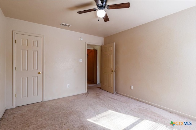 1513 Nicholas Cir, Killeen, TX 76542 - unfurnished bedroom featuring carpet, baseboards, and ceiling fan