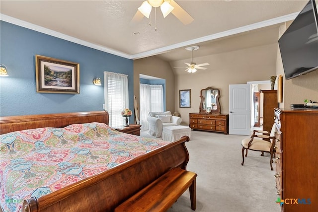 bedroom with vaulted ceiling, light colored carpet, a ceiling fan, and ornamental molding