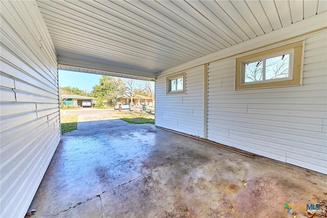 view of patio / terrace with a carport