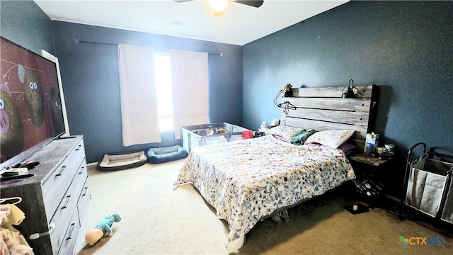 bedroom featuring carpet floors and a ceiling fan